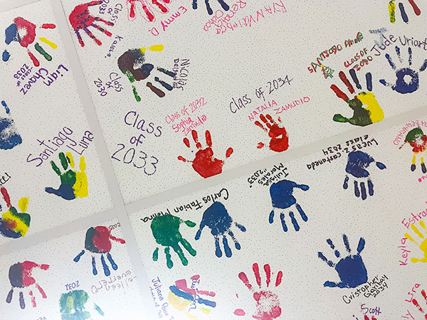 Ceiling tiles with painted handprints
