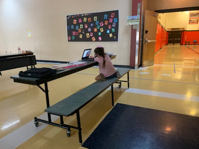 Student in Apache Junction School Cafeteria